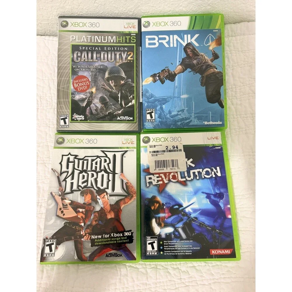 XBOX 360 Lot of 4 Games Call of Duty 2, Brink, Guitar Hero, Rock Revolution T